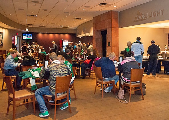 A couple enjoying arena concessions at an event in Cedar Park, TX